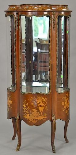 Marquetry inlaid Louis XV style curio cabinet with glass shelves and mirror back. ht. 56 1/2in., wd. 27in.