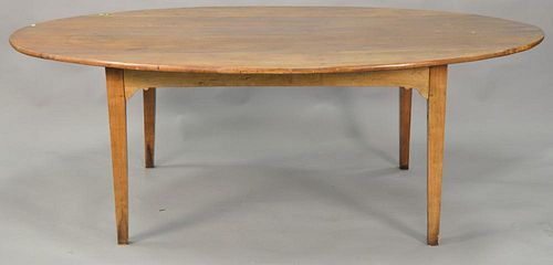 Continental fruitwood oval dining table. ht. 30in., top: 55" x 85"