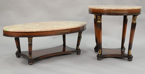 Two marble top tables, each with carved and gilt sphinx, round: ht. 28in., dia. 28in.,; coffee table: ht. 18in., top: 26" x 50"