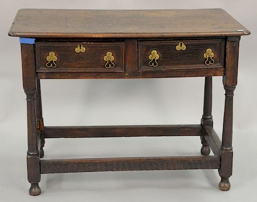 Oak center table with two drawers, late 19th century. ht. 27 1/2in., top: 20" x 37"
