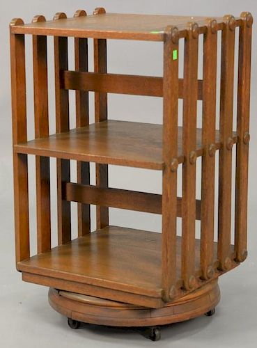 Oak revolving bookcase. ht. 31in., top: 17 1/2" x 17 1/2"