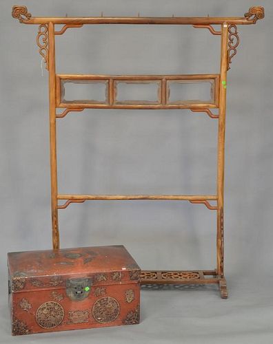 Two piece lot including Chinese rack and Chinese lift top chest. rack: ht. 72in., wd. 61in.; chest: ht. 14in., wd. 28in.