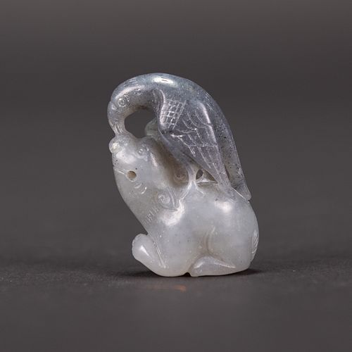 A CARVED WHITE&BLACK JADE EAGLE AND BEAR 