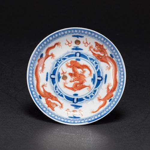 A BLUE AND WHITE AND IRON-RED 'DRAGON' DISH, QING DYNASTY, QIANLONG MARK 