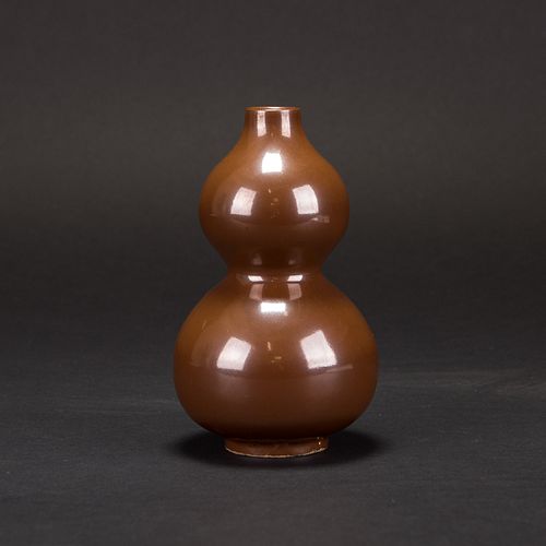 A PERSIMMON-GLAZED YAOZHOU DOUBLE-GOURD VASE