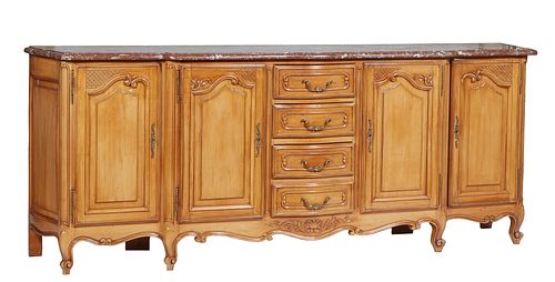 French Louis XV Style Carved Cherry Bombe Marble Top Sideboard, 20th c., the thick stepped bowfront highly figured brown marble over a central bank of