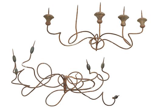Group of Two Italian Wrought Iron Pricket Candlestick Sconces, 19th c., one a five light example, four of the arms with wooden bobeches, H.- 11 in., W