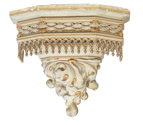 Large Polychromed Plaster Wall Bracket, 20th c., the stepped hexagonal top over a setback relief frieze with a pierced arched gallery, above a large s