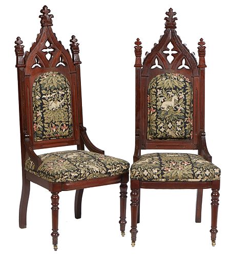 Pair of American Carved Mahogany Gothic Revival Side Chairs, 19th c., the arched back with pierced trefoil and quatrefoil decoration, over a cushioned