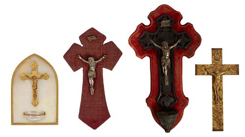 Group of Four French Crucifixes, early 20th c., one a holy water font on a brass mounted albaster back plate; one on a faux marble cross; a small exam