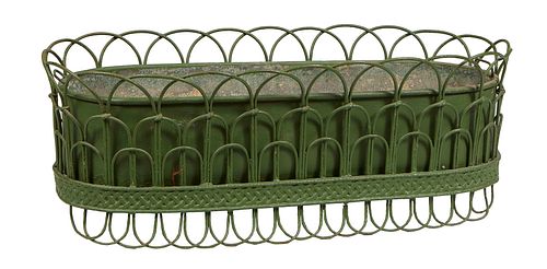 Iron Wirework Planter, early 20th c., of interlocking loop design, with a removable iron lifting plant tray, H.- 10 in., W.- 27 3/4 in., D.- 12 1/2 in