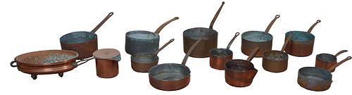 Group of Fourteen French Copper Cooking Items, 19th c., consisting of 11 iron handled sauce pans, two pans with pouring spouts, and an oval double han