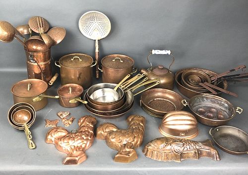 A Group of Copper Pots, Pans, and Utensils