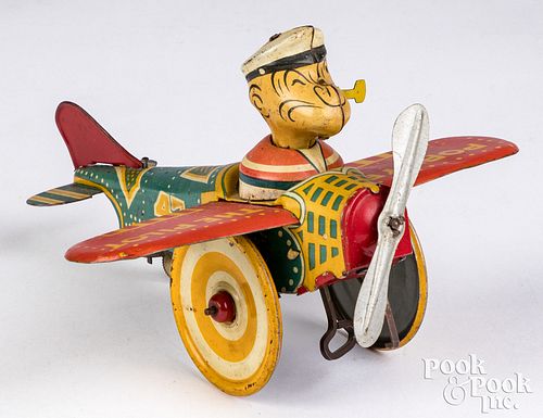 Marx Popeye lithographed tin airplane wind-up toy