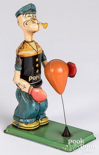 Chein lithographed tin wind-up Popeye punching bag