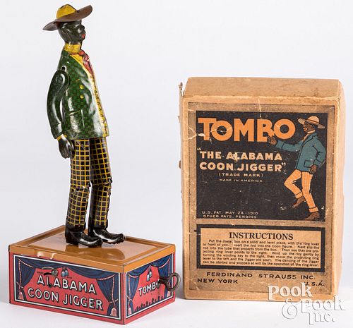 Strauss lithographed tin wind-up Tombo jigger