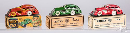 Three Marx Tricky Taxi wind-up cars