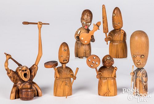 Six carved and stained wood Kobe figures