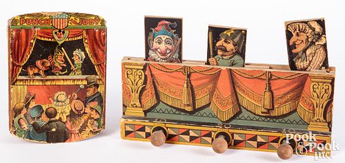 Two lithographed paper on wood Punch and Judy toys