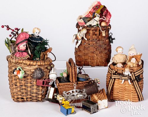 Peddlers baskets filled with numerous miniatures