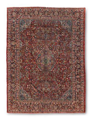 A Persian Sarouk area rug