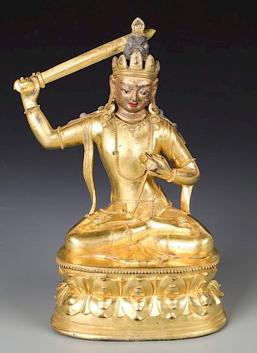 Antique Sino-Tibetan Gilt Bronze Buddha with Sword