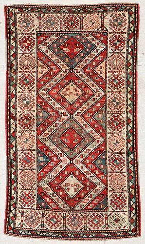 Antique Kazak Rug: 3'10" x 6'7" (117 x 201 cm)