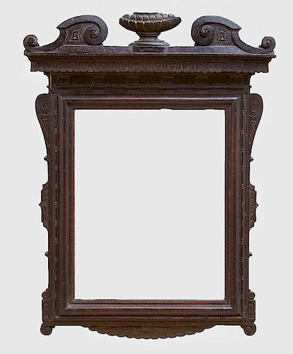 ITALIAN BAROQUE BROWN-STAINED AND CARVED WOOD PICTURE FRAME