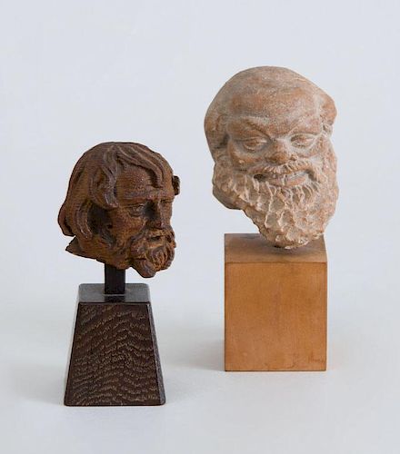 ROMAN TERRACOTTA HEAD OF SILENNS AND MEDIEVAL STYLE CARVED WOOD HEAD OF AN APOSTLE