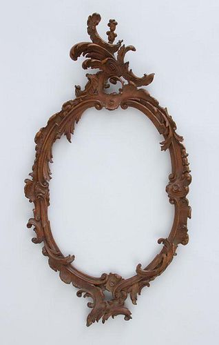 ITALIAN ROCOCO STYLE CARVED GILTWOOD OVAL FRAME