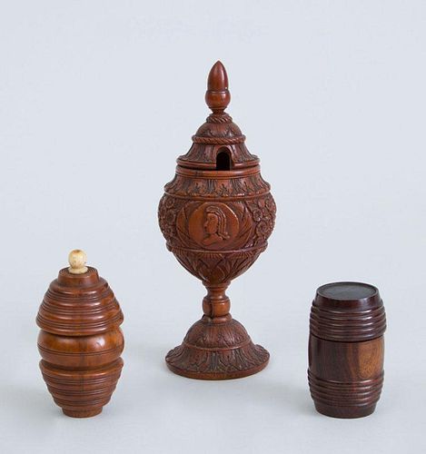 CONTINENTAL CARVED BOXWOOD STEMMED MUSTARD CUP AND COVER AND TWO TREENWARE BARREL-FORM BOXES