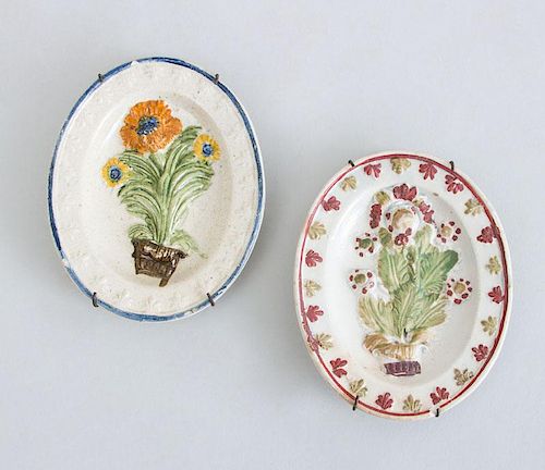 TWO ENGLISH CREAMWARE RELIEF-DECORATED MINIATURE OVAL PLATTERS
