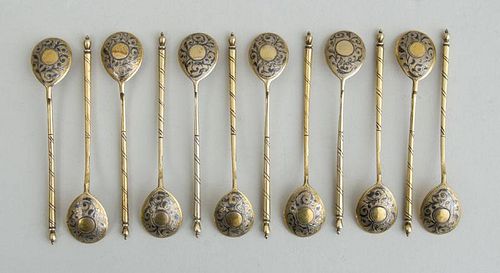 SET OF TWELVE RUSSIAN GILDED SILVER AND NIELLO TEASPOONS