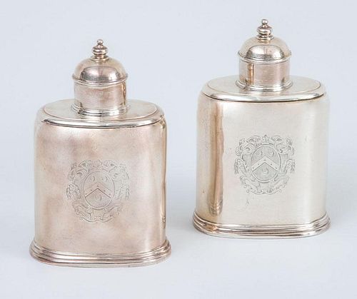 PAIR OF ARMORIAL SILVER TEA CADDIES AND COVERS