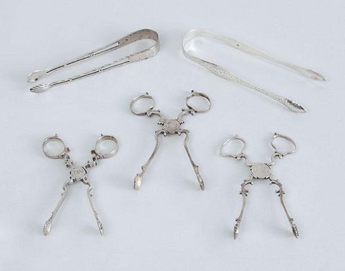 THREE PAIRS OF GEORGE III SILVER SCISSOR-FORM SUGAR NIPS AND TWO PAIRS OF TONGS
