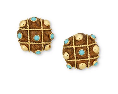 A pair of wood and turquoise ear clips