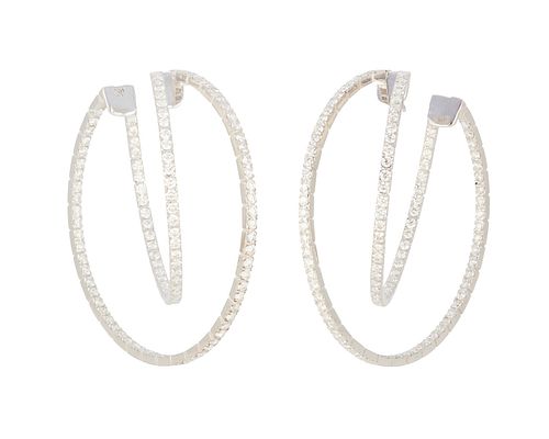 A pair of diamond double hoop earrings