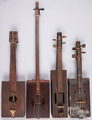 Four homemade folk art stringed instruments