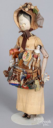 Peg wooden peddler doll, 19th c.