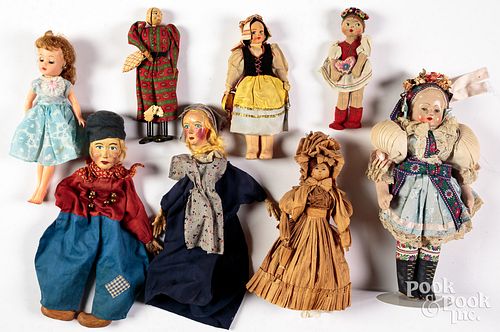 Eight dolls and puppets, 20th c.