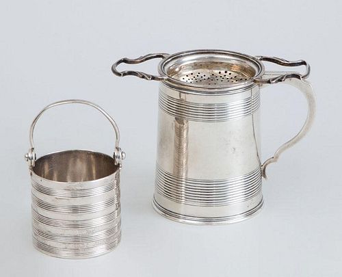 VICTORIAN MONOGRAMMED SILVER MUG, A GEORGE III SILVER PAIL AND A SILVER STRAINER