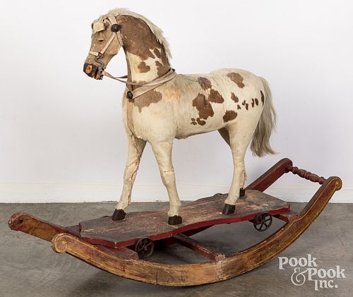 Hide covered rocking horse pull toy, 19th c.