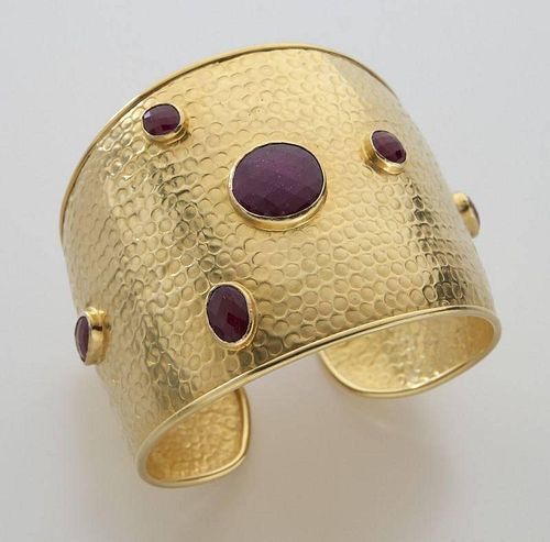 18K yellow gold and ruby cuff bracelet.