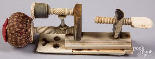 Elaborate carved bone sewing pin cushion clamp