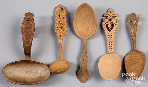 Five Scandinavian carved wedding spoons