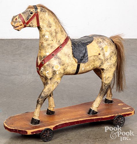 Carved and painted horse pull toy, 19th c.