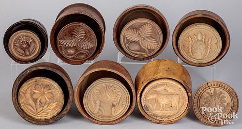 Eight carved butter prints, 19th c.