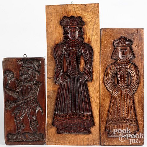 Three carved cakeboards