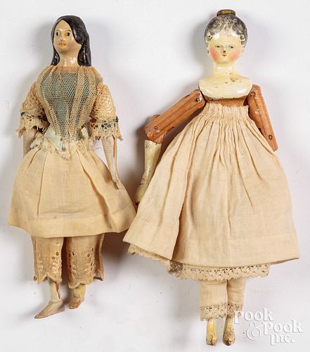 Two early small dolls