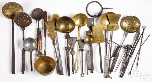 Group of wrought iron and brass utensils